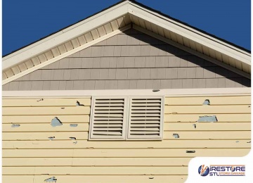 How to Deal With Siding Damage After a Storm