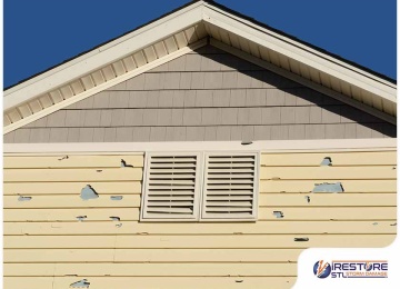 How to Deal With Siding Damage After a Storm